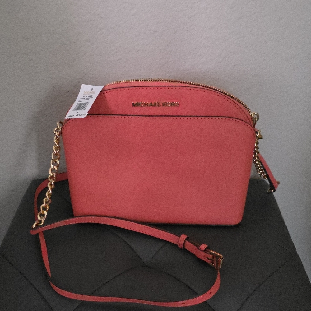 Michael Kors Pink and Gold Crossbody Bag with Sleek Design